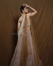 Mookuthi Amman 2 Actress Regina Cassandra in an Embellished Beige Lehenga Photos 02