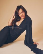 Most Desirable Actress Neha Sharma in a Sensuous Black Floor Length Gown with a Deep Cleavage Photos 05