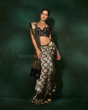 Most Popular Face of the Year Raashii Khanna in a Black Silk Saree with an Off Shoulder Cleavage Blouse Photos 04 Most Popular Face of the Year Raashii Khanna in a Black Silk Saree with an Off Shoulder Cleavage Blouse Photos 04