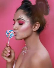 Nela Ticket Movie Heroine Malvika Sharma Kissing a Lollipop Picture 01