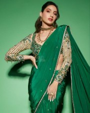 Nora Fatehi in a Green Saree Photo 01