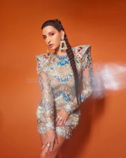 Nora Fatehi in an Embellished Falguni Shane Peacock Mini Dress Photos 02