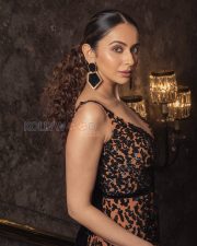Opulent Rakul Preet Singh Cleavage in a Black Leopard Print Embellished Sheer Slit Gown Photos 02