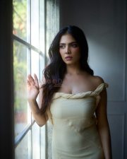 Passionate Malavika Mohanan in a Yellow Bodycon Dress Photos 02