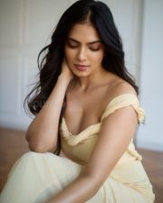 Passionate Malavika Mohanan in a Yellow Bodycon Dress Photos 03
