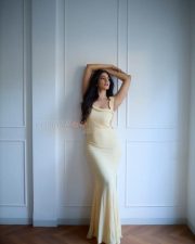 Passionate Malavika Mohanan in a Yellow Bodycon Dress Photos 04