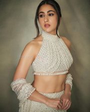 Pati Patni Aur Woh Do Heroine Sara Ali Khan in a Ivory Pearl Embellished Halter Neck Blouse and Fishtail Skirt Pictures 04