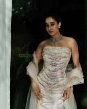 Peddi Actress Janhvi Kapoor Strapless Shimmering Floor Length Gown with a Sheer Ivory Dupatta Photos 01
