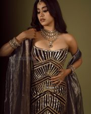 Peddi Actress Janvhi Kapoor in a Black and Silver Strapless Embellished Bodycon Gown Photos 01