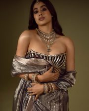 Peddi Actress Janvhi Kapoor in a Black and Silver Strapless Embellished Bodycon Gown Photos 04