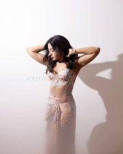 Phani Actress Catherine Tresa in a Pastel Floral Printed Crop Top and Flowy Skirt Photos 01