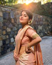 Photogenic Malayalam Actress Nivetha Thomas in a Peach Silk Saree with a Matching Blouse Pictures 01