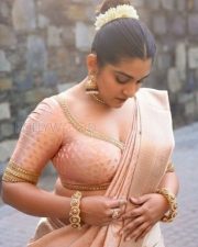Photogenic Malayalam Actress Nivetha Thomas in a Peach Silk Saree with a Matching Blouse Pictures 02