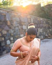 Photogenic Malayalam Actress Nivetha Thomas in a Peach Silk Saree with a Matching Blouse Pictures 04