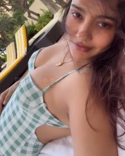 Playful Neha Sharma Cleavage in a Green gingham check swimsuit Photos 01