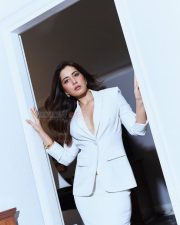 Poised Actress Raashi Khanna in a White Pantsuit Photos 03