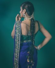 Popular Sexy Beauty Nidhhi Agerwal in a Royal Blue Saree with Golden Floral Embroidered Border and a Green Sleeveless Blouse Pictures 04