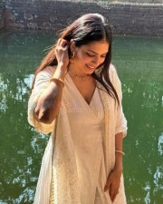 Pretty Malavika Mohanan in a White Kurta Photos 01