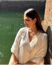 Pretty Malavika Mohanan in a White Kurta Photos 02