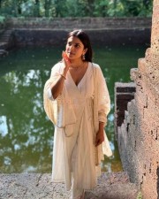 Pretty Malavika Mohanan in a White Kurta Photos 03