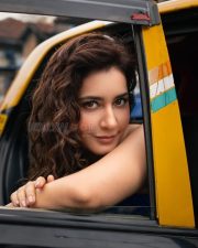 Pretty Raashi Khanna in a Mumbai Taxi wearing a Blue Outfit with Spaghetti Straps Pictures 01