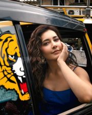 Pretty Raashi Khanna in a Mumbai Taxi wearing a Blue Outfit with Spaghetti Straps Pictures 03