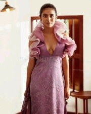 Priya Prakash Varrier Hot Cleavage in Purple Gown Photos 01
