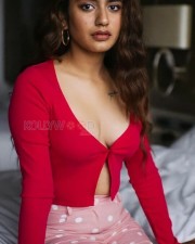 Priya Prakash Varrier in a Red Hot Cleavage Photo 01
