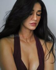 Provocative Disha Patani Cleavage in a Backless Brown Halter Neck Top Photos 01