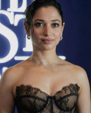 Purushan Heroine Tamannaah Bhatia in an Off Shoulder Black Lace Corset Nude Gown Photos 09