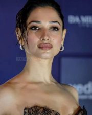 Purushan Heroine Tamannaah Bhatia in an Off Shoulder Black Lace Corset Nude Gown Photos 10