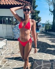 Radiant Actress Ananya Panday in a Red string bikini Photos 01