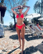Radiant Actress Ananya Panday in a Red string bikini Photos 02