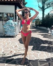 Radiant Actress Ananya Panday in a Red string bikini Photos 03