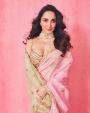 Radiant Actress Kiara Advani in a Pink Gold Embellished Saree Photos 01