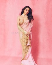 Radiant Actress Kiara Advani in a Pink Gold Embellished Saree Photos 02