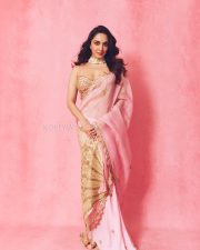 Radiant Actress Kiara Advani in a Pink Gold Embellished Saree Photos 04