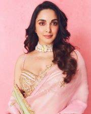 Radiant Actress Kiara Advani in a Pink Gold Embellished Saree Photos 06