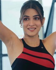 Radiant Actress Kriti Sanon in a Black Red Striped Sports Bra Photos 02