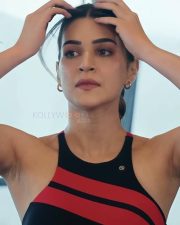Radiant Actress Kriti Sanon in a Black Red Striped Sports Bra Photos 03