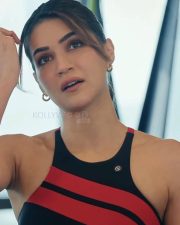 Radiant Actress Kriti Sanon in a Black Red Striped Sports Bra Photos 04