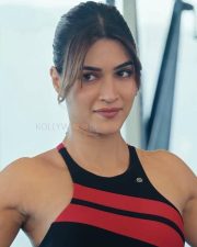 Radiant Actress Kriti Sanon in a Black Red Striped Sports Bra Photos 05