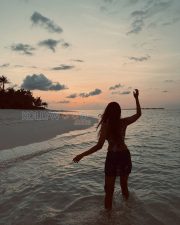 Radiant Actress Malavika Mohanan in a Blue Printed Bikini Sarong Photos 02 Radiant Actress Malavika Mohanan in a Blue Printed Bikini Sarong Photos 02