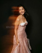 Radiant Actress Pooja Hegde in a Blush Pink Organza Strapless Gown Photos 01