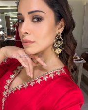 Radiant Nushrratt Bharuccha Cleavage in a White Embroidered Mirror Work Lehenga Blouse Photos 04