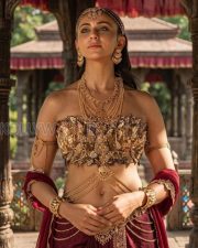 Ramayana Part I Actress Rakul Preet Singh in a Gold Mythological Armor Costume Photos 01