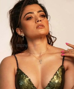 Rashmika Mandanna in Green Sparkly Sexy Low Cut Dress Photos 03