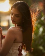 Ravishing Heroine Malavika Mohanan in an Ivory and Red Chiffon Bandhani Printed Maxi Dress Pictures 04 Ravishing Heroine Malavika Mohanan in an Ivory and Red Chiffon Bandhani Printed Maxi Dress Pictures 04