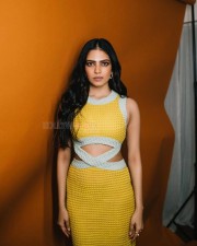 Ravishing Hottie Malavika Mohanan in a Yellow Knitted Maxi Dress Photos 01