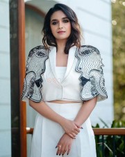 Ravishing Keerthy Suresh at Siren Movie Event in a White Shirt and Pant with Stylish Designer Shoulders Photos 05